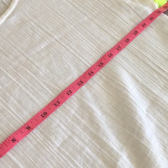 Lolli White cotton cover up with multi colored fringe. - Picture 5 of 7